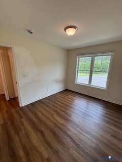 793 Correctional Center Road Dillwyn, VA 23936 - Photo 13 of 19 an empty room with wooden floor and windows