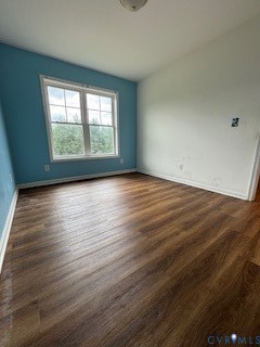 793 Correctional Center Road Dillwyn, VA 23936 - Photo 14 of 19 an empty room with wooden floor and windows