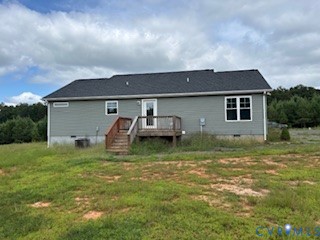 793 Correctional Center Road Dillwyn, VA 23936 - Photo 16 of 19 a backyard of house with barbeque oven and outdoor seating