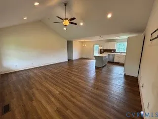 a view of a kitchen with a sink and microwave
