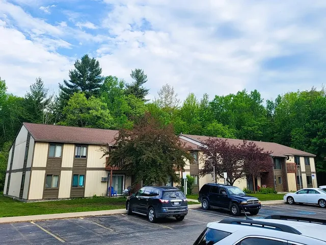 a car parked in front of a house
