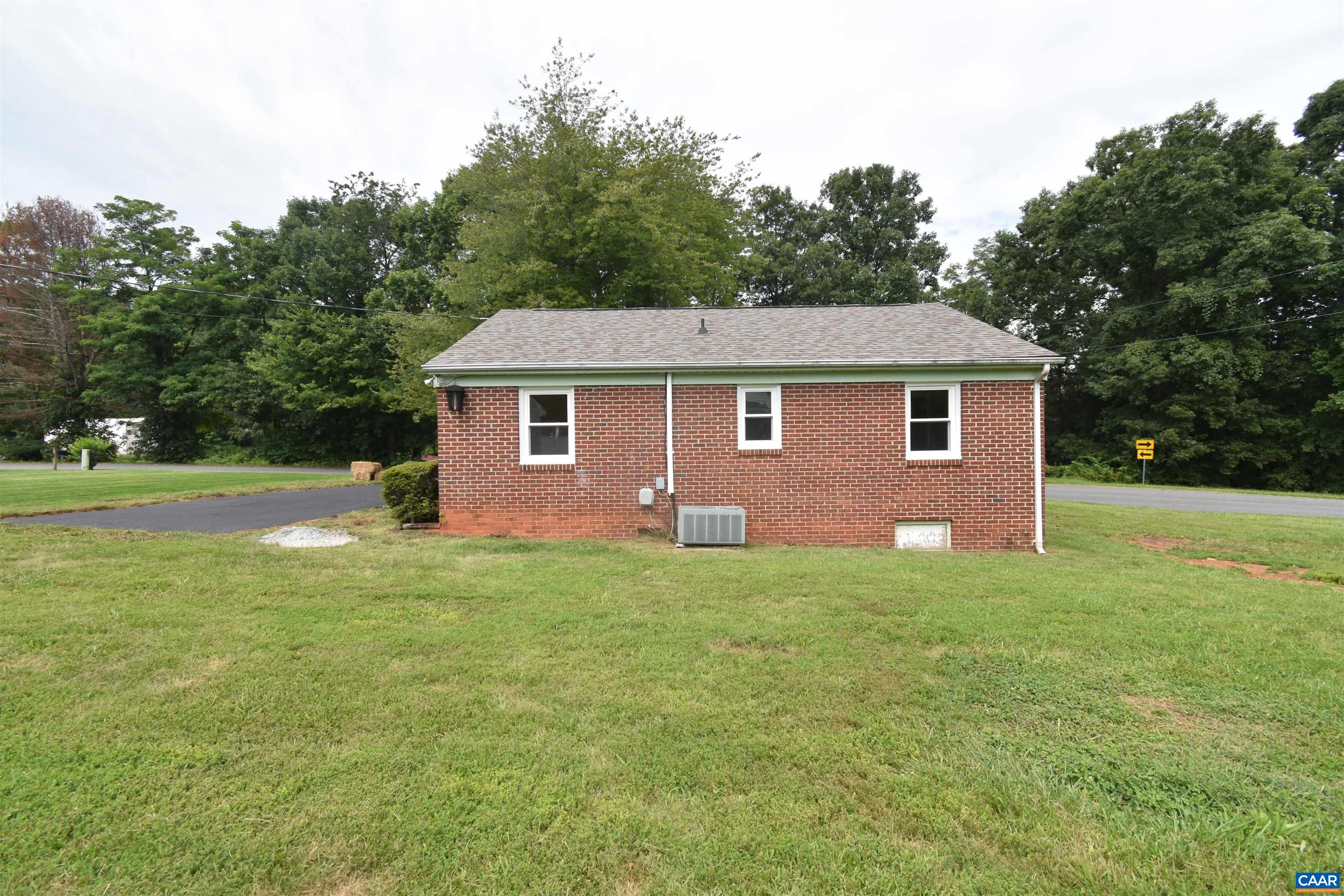 100 Locust Lane Ruckersville, VA 22968 - Photo 4 of 25 a view of a house with a backyard