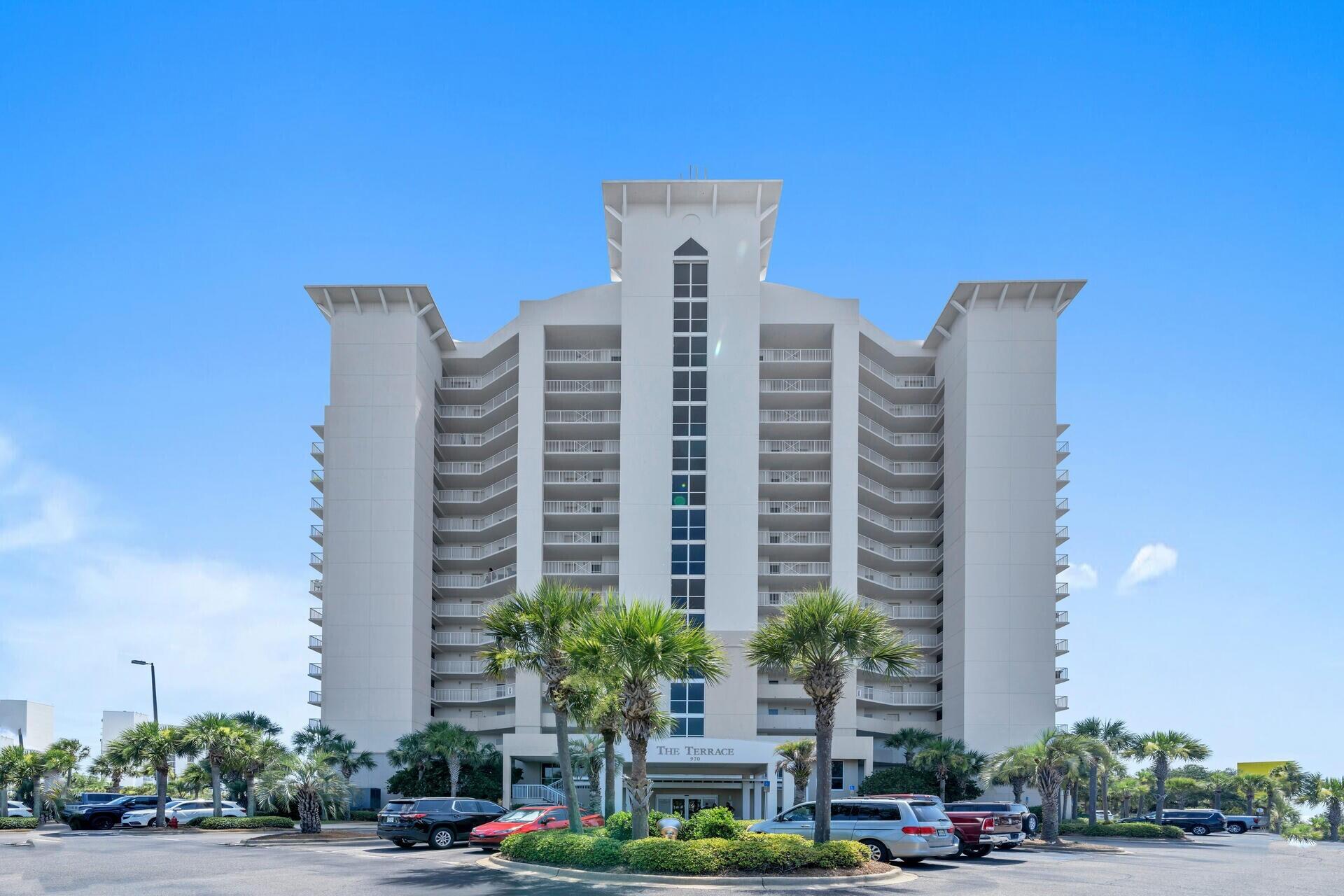 970 Highway 98, Unit 303 Destin, FL 32541 - Photo 42 of 42 a front view of a building with street view