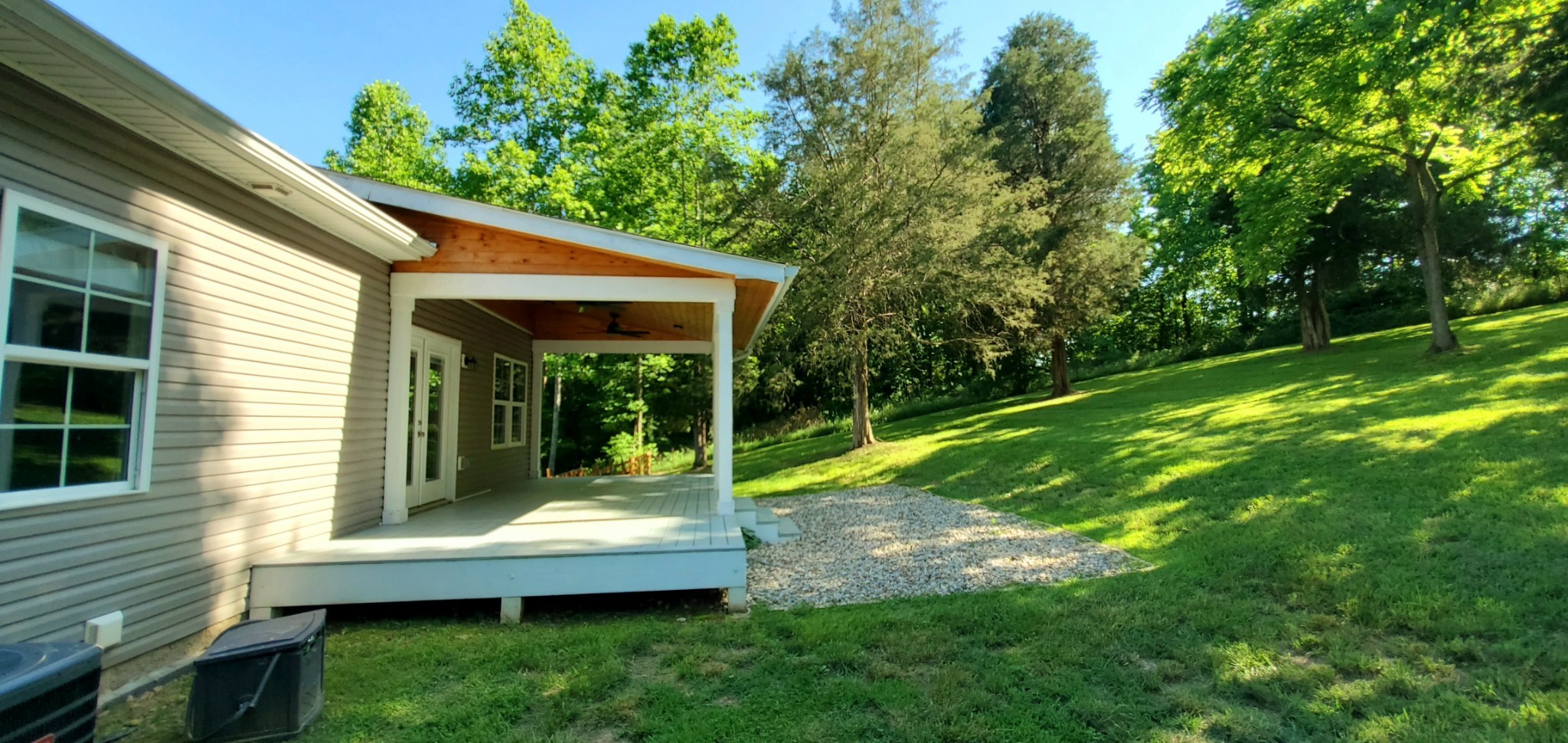 2004 McMahan Hollow Road Pleasant View, TN 37146 - Photo 2 of 17 a view of a small house with a backyard