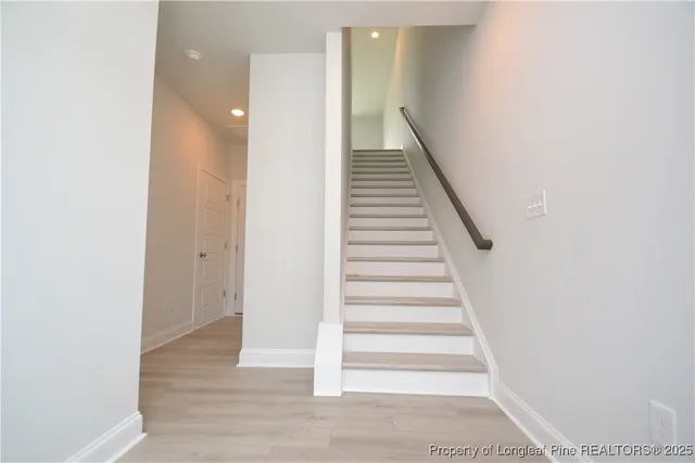 a view of entryway with wooden floor