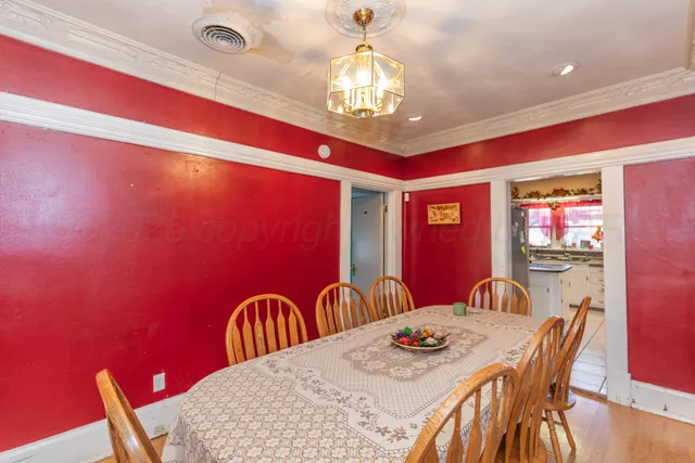 a view of a dining room with furniture