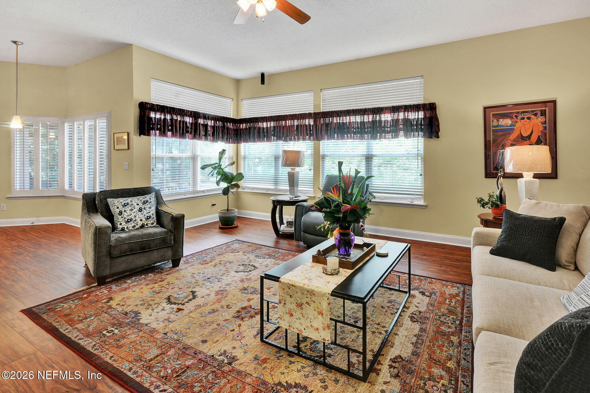 5950 West Shores Road Orange Park, FL 32003 - Photo 19 of 42 a living room with furniture and a large window