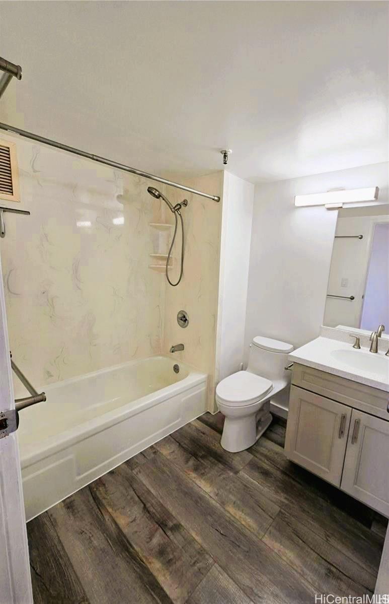 3033 Ala Ilima Street, Unit 1001 Honolulu, HI 96818 - Photo 10 of 12 a bathroom with a sink a toilet and a bathtub