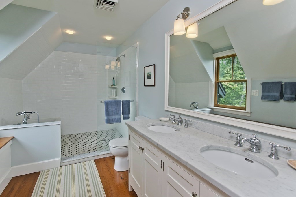 141 Franklin Hill Road Colrain, MA 01340 - Photo 27 of 42 a bathroom with a sink a toilet and a mirror