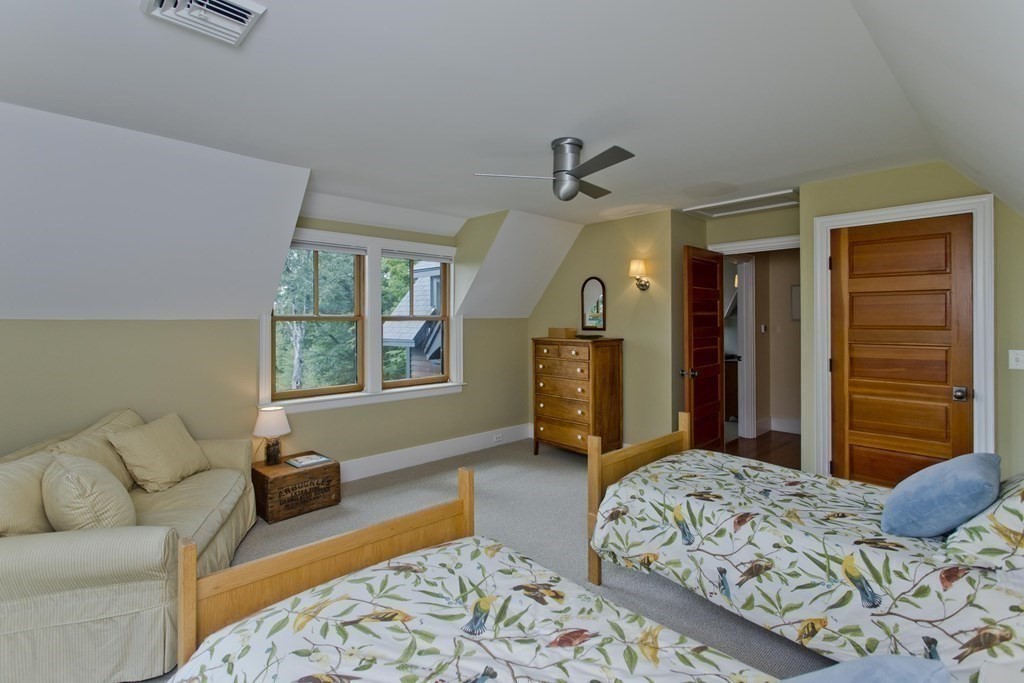 141 Franklin Hill Road Colrain, MA 01340 - Photo 29 of 42 a bedroom with a bed a couch and dresser
