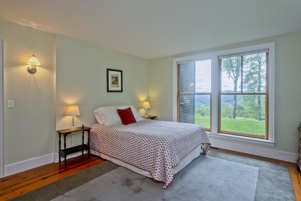 141 Franklin Hill Road Colrain, MA 01340 - Photo 34 of 42 a bedroom with a bed and a window