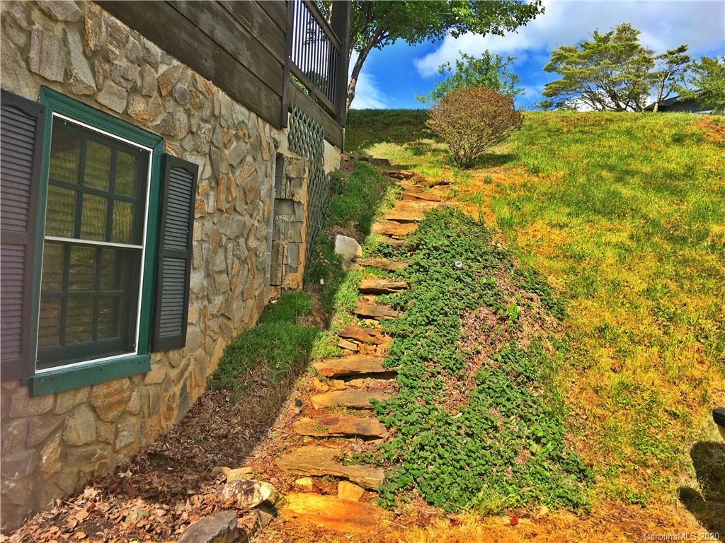 2156 Orchard Road, Unit 1 & 2 Deep Gap, NC 28618 - Photo 11 of 33 a view of a pathway of a house with a yard