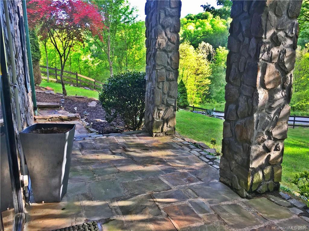 2156 Orchard Road, Unit 1 & 2 Deep Gap, NC 28618 - Photo 13 of 33 a backyard of a house with lots of green space