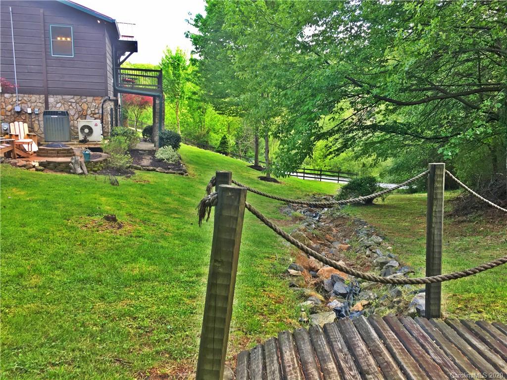 2156 Orchard Road, Unit 1 & 2 Deep Gap, NC 28618 - Photo 17 of 33 a view of yard from deck having patio