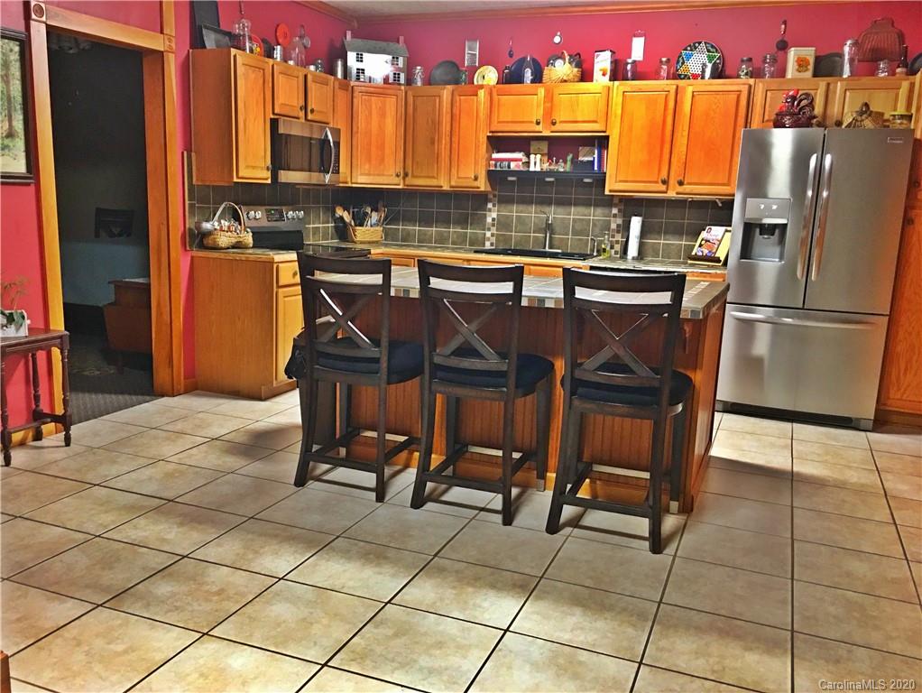 2156 Orchard Road, Unit 1 & 2 Deep Gap, NC 28618 - Photo 20 of 33 a view of a kitchen with a sink and cabinets