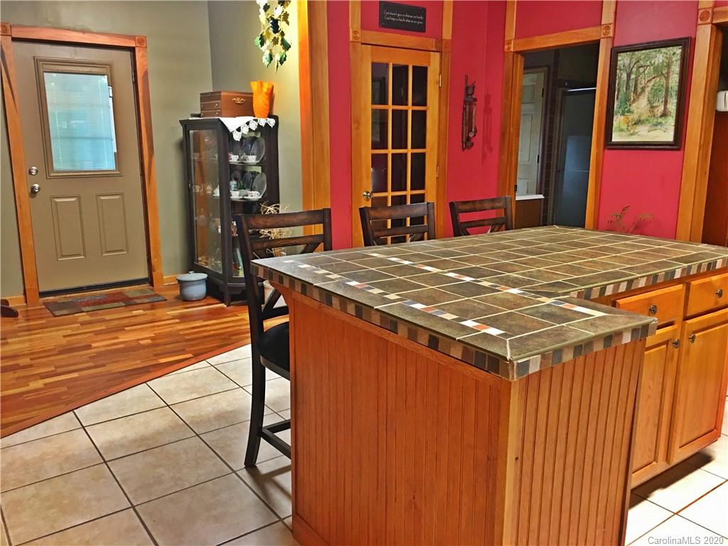 2156 Orchard Road, Unit 1 & 2 Deep Gap, NC 28618 - Photo 21 of 33 a room with musical instruments