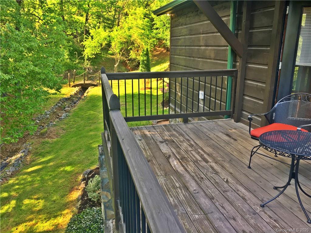 2156 Orchard Road, Unit 1 & 2 Deep Gap, NC 28618 - Photo 5 of 33 a view of a backyard with sitting area