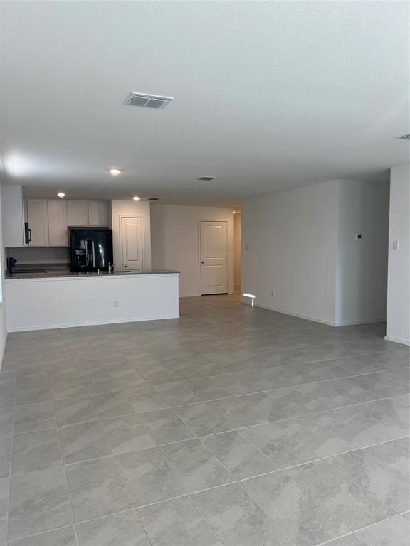 427 Ashbrook Way Princeton, TX 75407 - Photo 11 of 25 a view of a kitchen with a sink