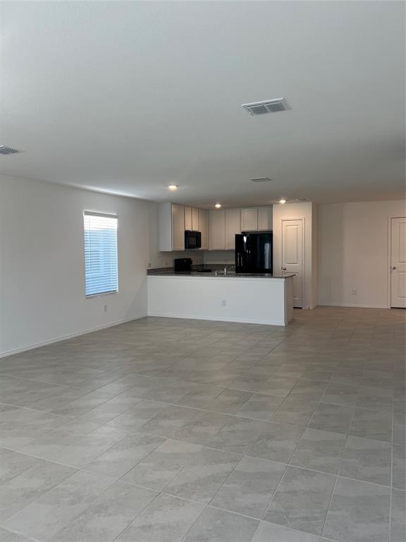 427 Ashbrook Way Princeton, TX 75407 - Photo 4 of 25 a view of a kitchen with a sink
