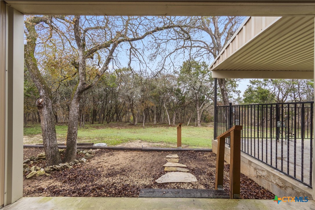 114 Deer Run Moody, TX 76557 - Photo 32 of 40 View of backyard from covered parking/breezeway area.
