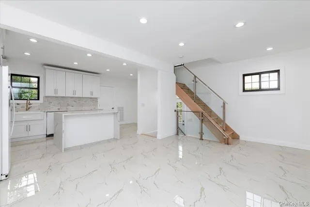 a view of kitchen with cabinets and a stainless steel appliances