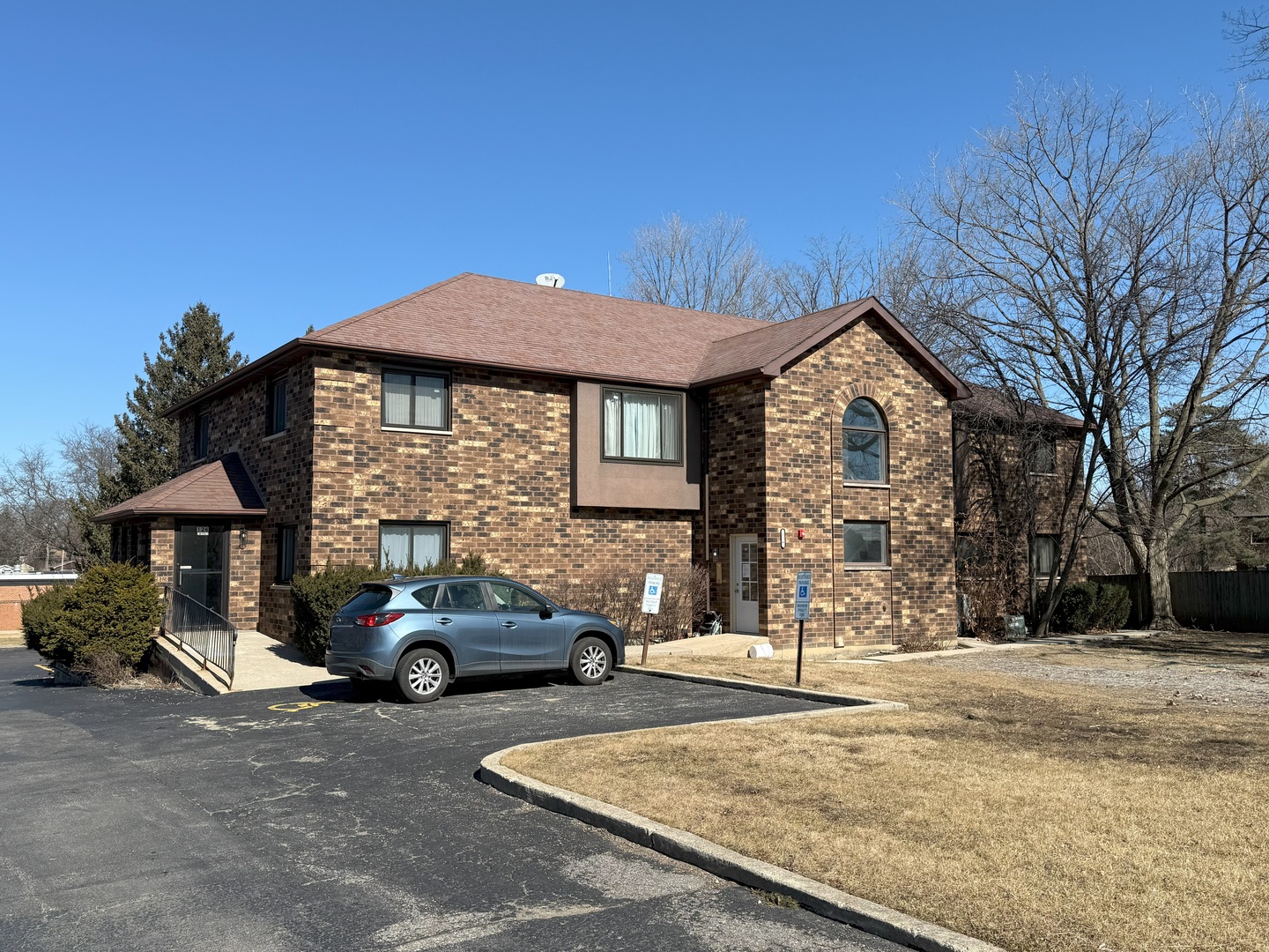 126 West Maple Avenue Mundelein, IL 60060 - Photo 1 of 65 a front view of a house with a yard