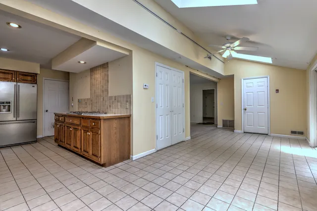 a view of kitchen with windows
