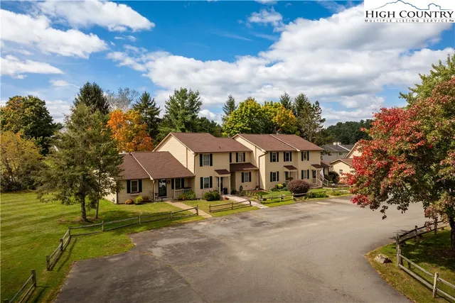 a view of an house with outdoor space and sitting area
