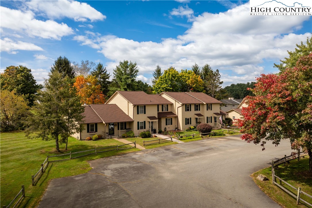 212 Carriage Lamp Court Boone, NC 28607 - Photo 2 of 29 a view of an house with outdoor space and sitting area