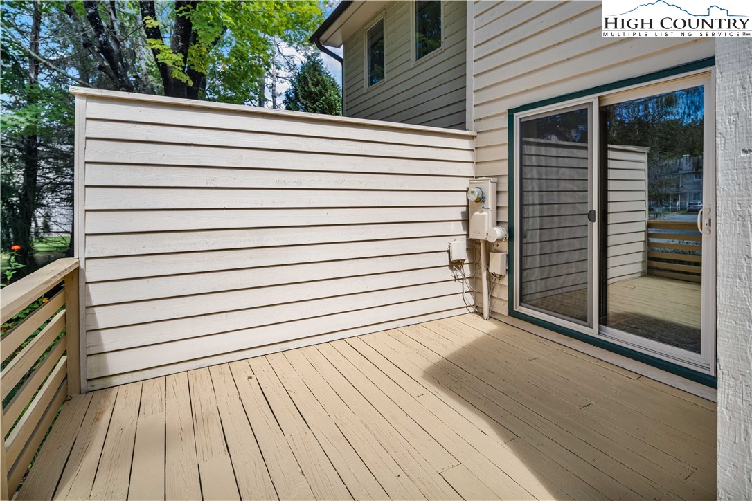 212 Carriage Lamp Court Boone, NC 28607 - Photo 25 of 29 a view of a house with a roof deck