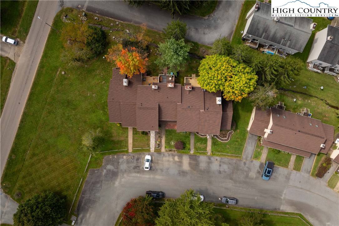 212 Carriage Lamp Court Boone, NC 28607 - Photo 28 of 29 an aerial view of a house with a yard basket ball court and outdoor seating