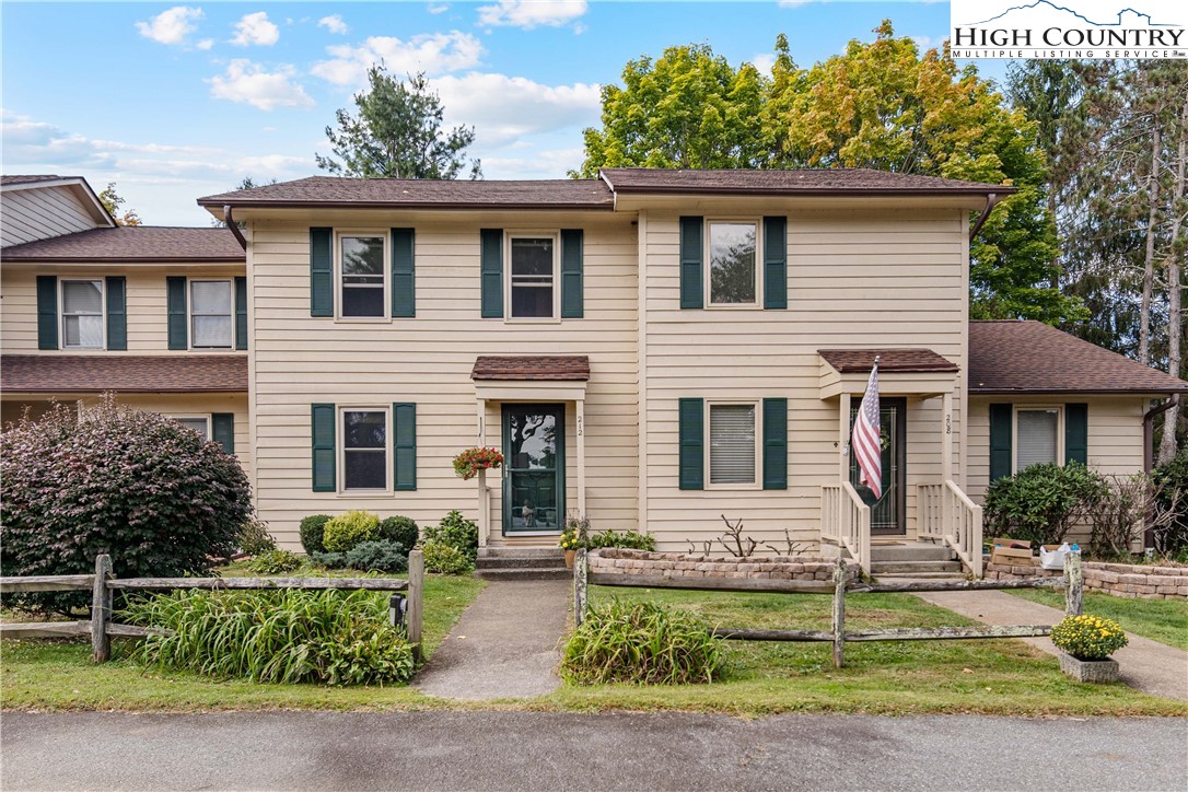 212 Carriage Lamp Court Boone, NC 28607 - Photo 4 of 29 a front view of a house with a yard