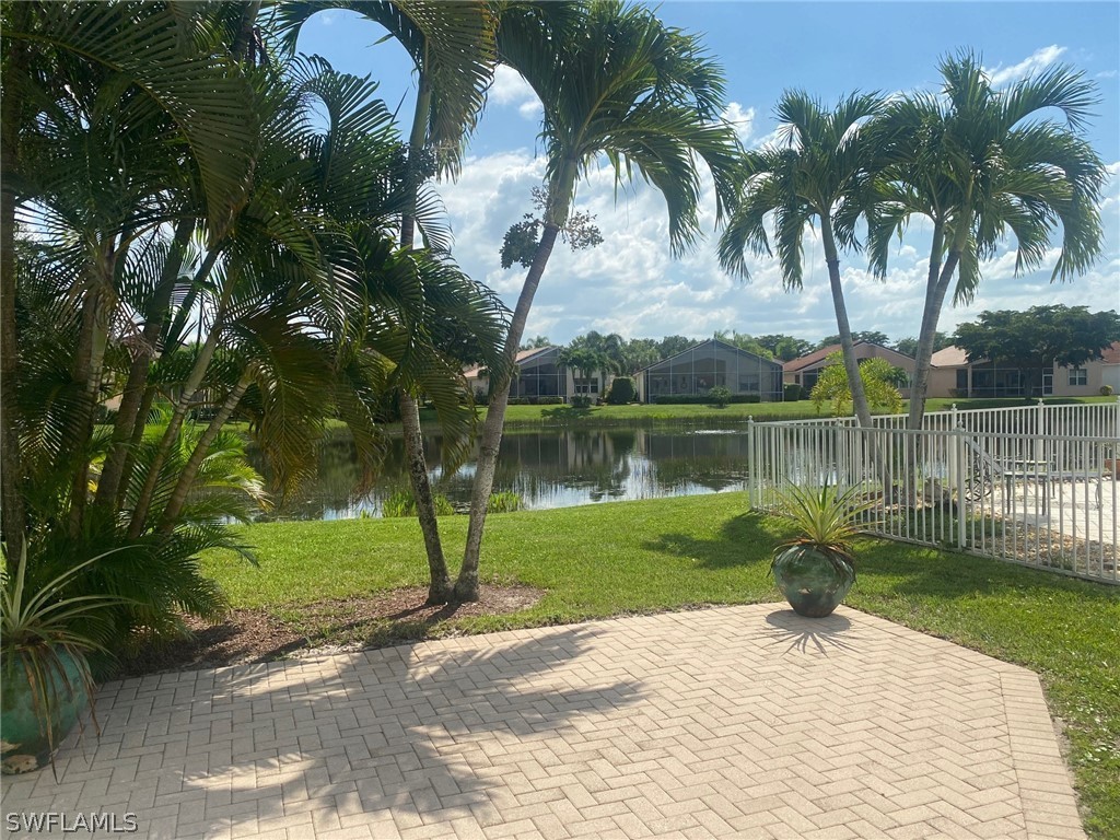 9319 Springview Loop Estero, FL 33928 - Photo 2 of 23 a view of a garden with a lake view