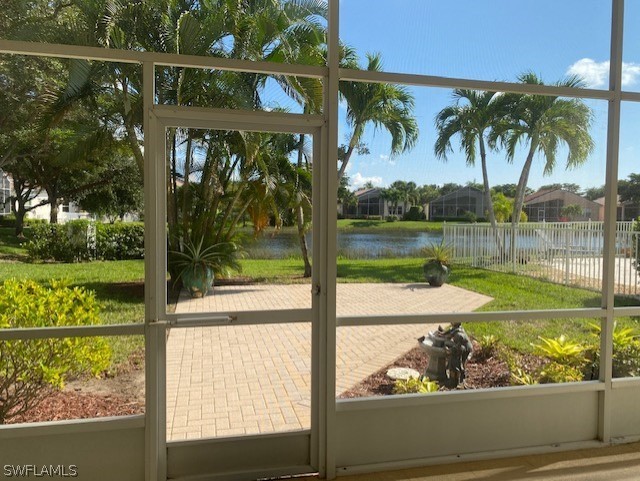 9319 Springview Loop Estero, FL 33928 - Photo 22 of 23 a view of a lake from a balcony