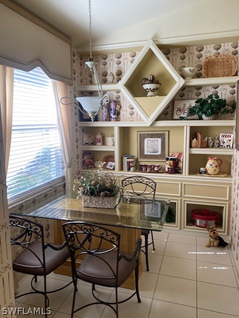 9319 Springview Loop Estero, FL 33928 - Photo 6 of 23 a view of a dining room with furniture and chandelier