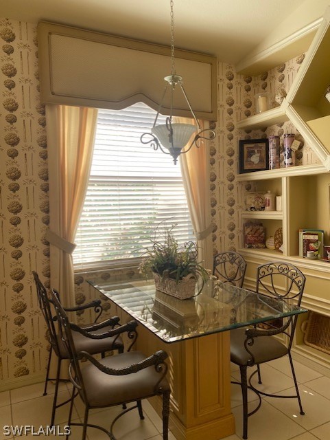 9319 Springview Loop Estero, FL 33928 - Photo 7 of 23 a view of a dining room with furniture and a window