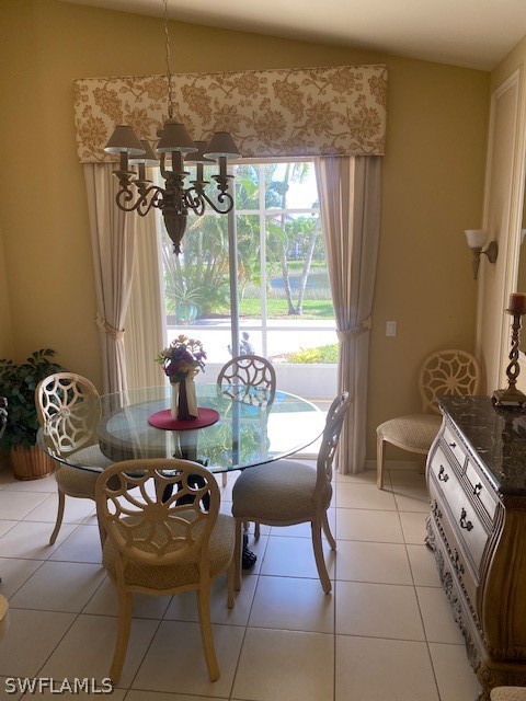 9319 Springview Loop Estero, FL 33928 - Photo 9 of 23 a dining room with furniture and window