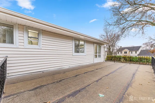 a view of a house with a street