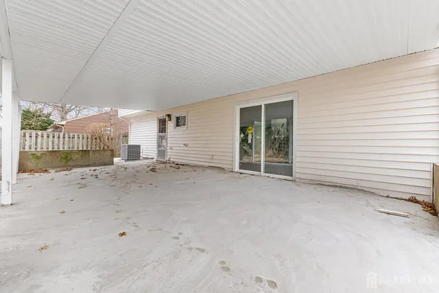 an empty room with sliding door