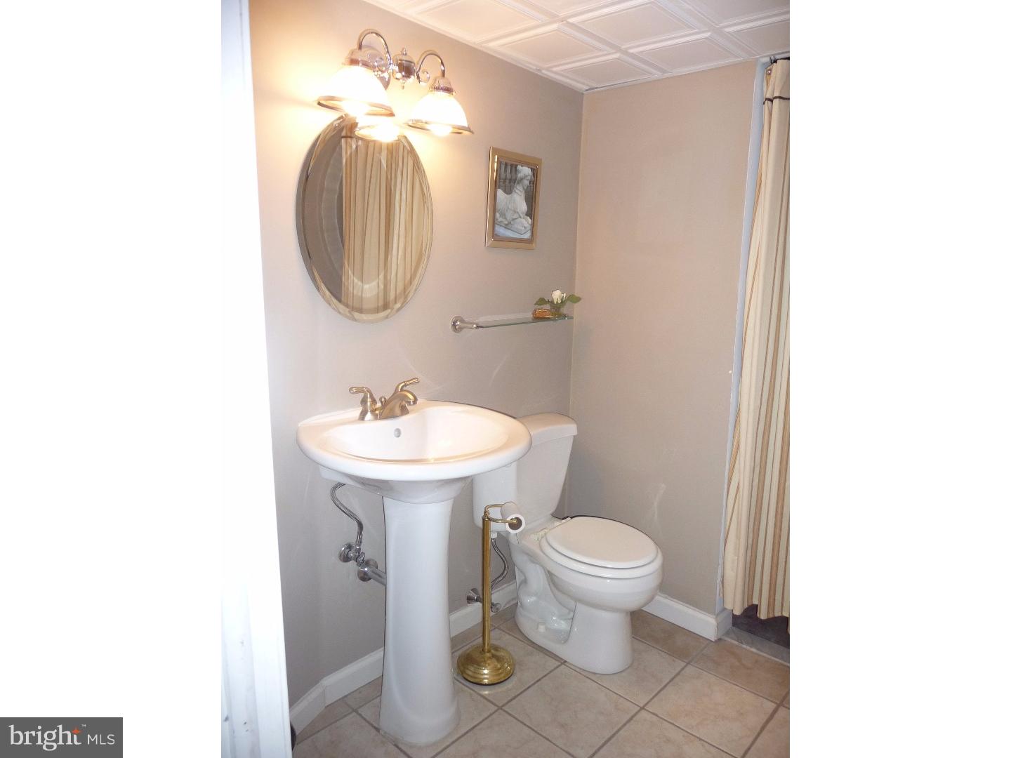 11 Locust Road Morton, PA 19070 - Photo 14 of 16 Half Bath