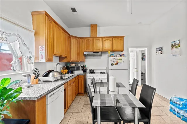 a bedroom with a bed and furniture