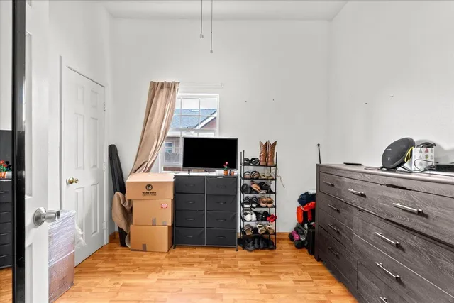 a room with furniture and a flat screen tv