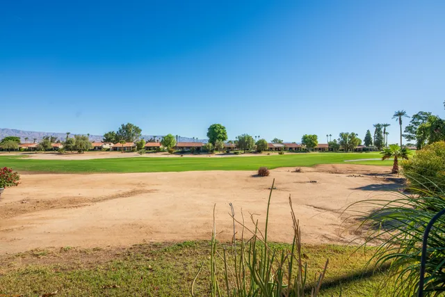 a view of a lake with a big yard