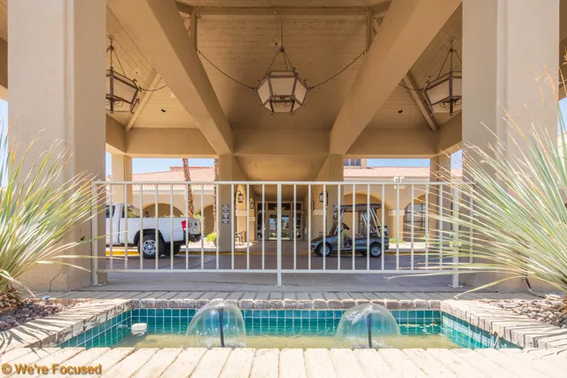 a view of swimming pool with outdoor seating