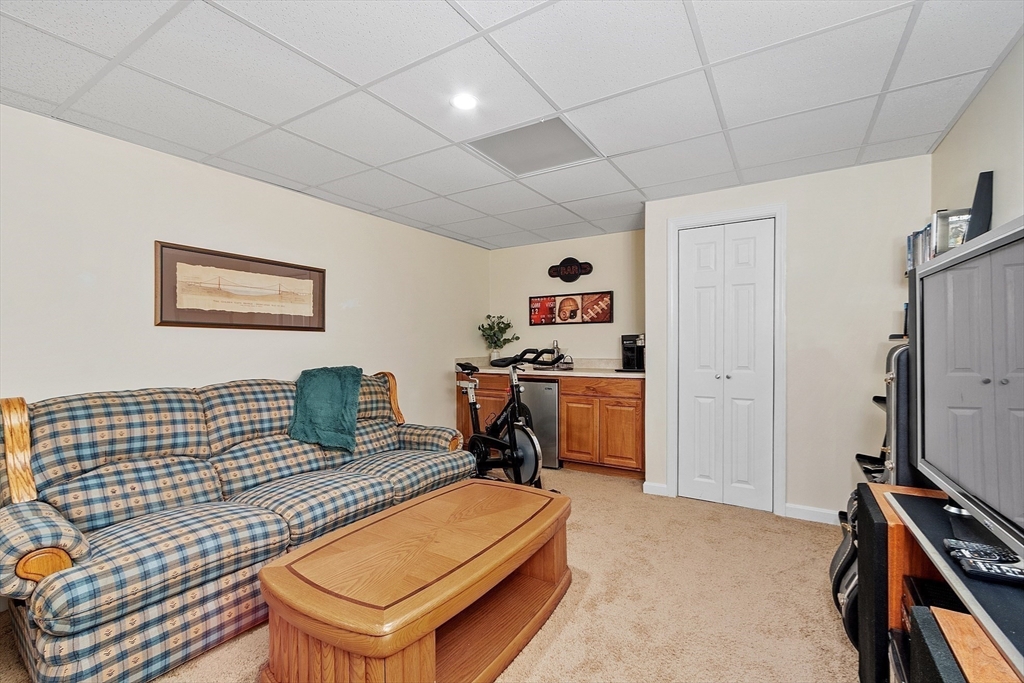 25 Hemlock Road Groton, MA 01450 - Photo 24 of 37 a living room with furniture