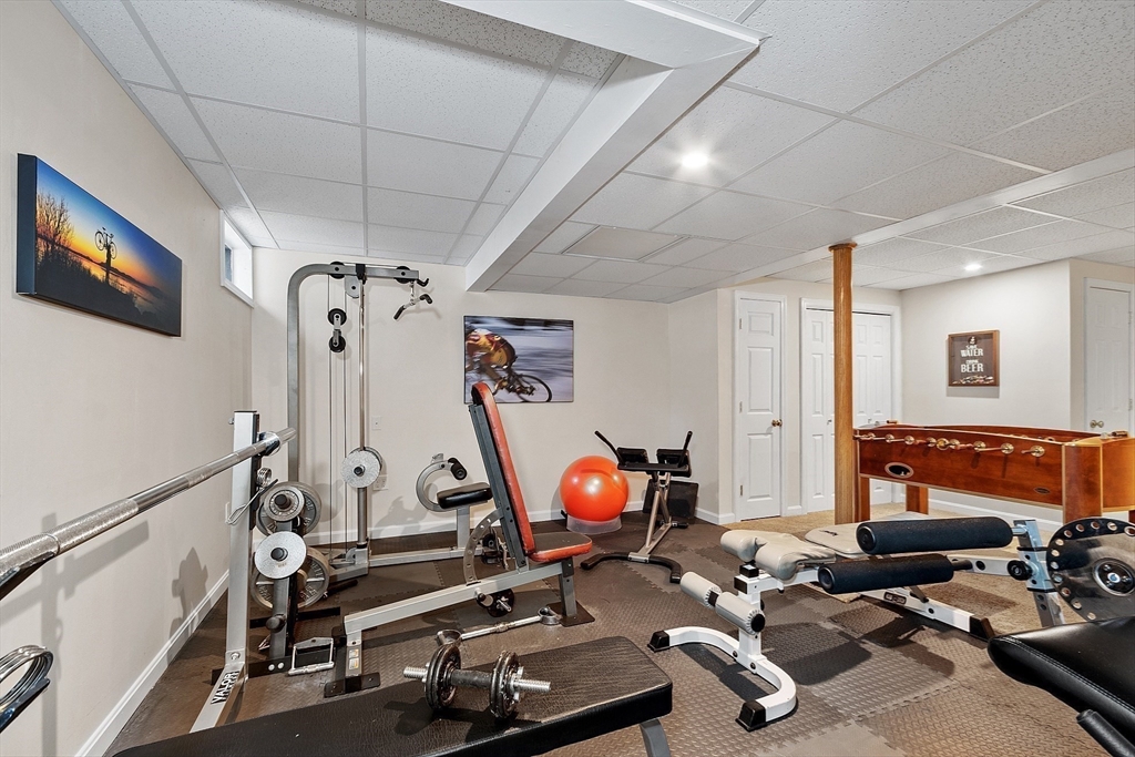 25 Hemlock Road Groton, MA 01450 - Photo 27 of 37 a view of a room with gym equipment