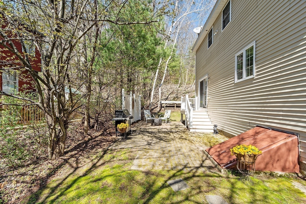 25 Hemlock Road Groton, MA 01450 - Photo 30 of 37 a view of backyard of the house