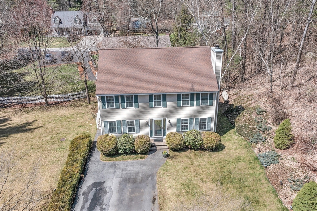 25 Hemlock Road Groton, MA 01450 - Photo 32 of 37 a view of a house with a yard