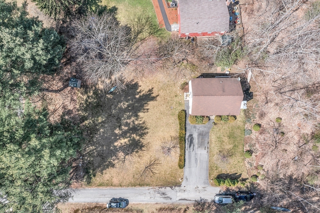 25 Hemlock Road Groton, MA 01450 - Photo 33 of 37 a aerial view of a house with a yard