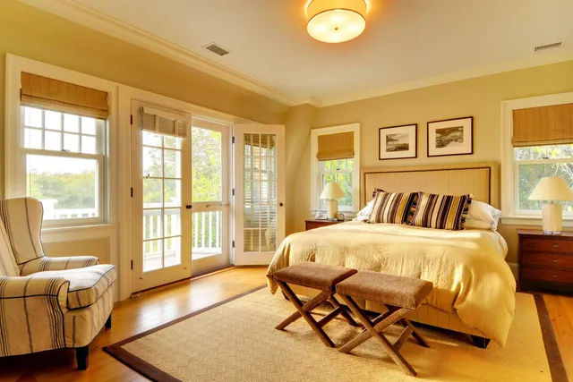 a bedroom with a bed and a couch